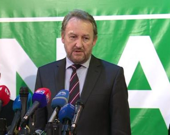 Izetbegović osudio odluku o prebivalištu
